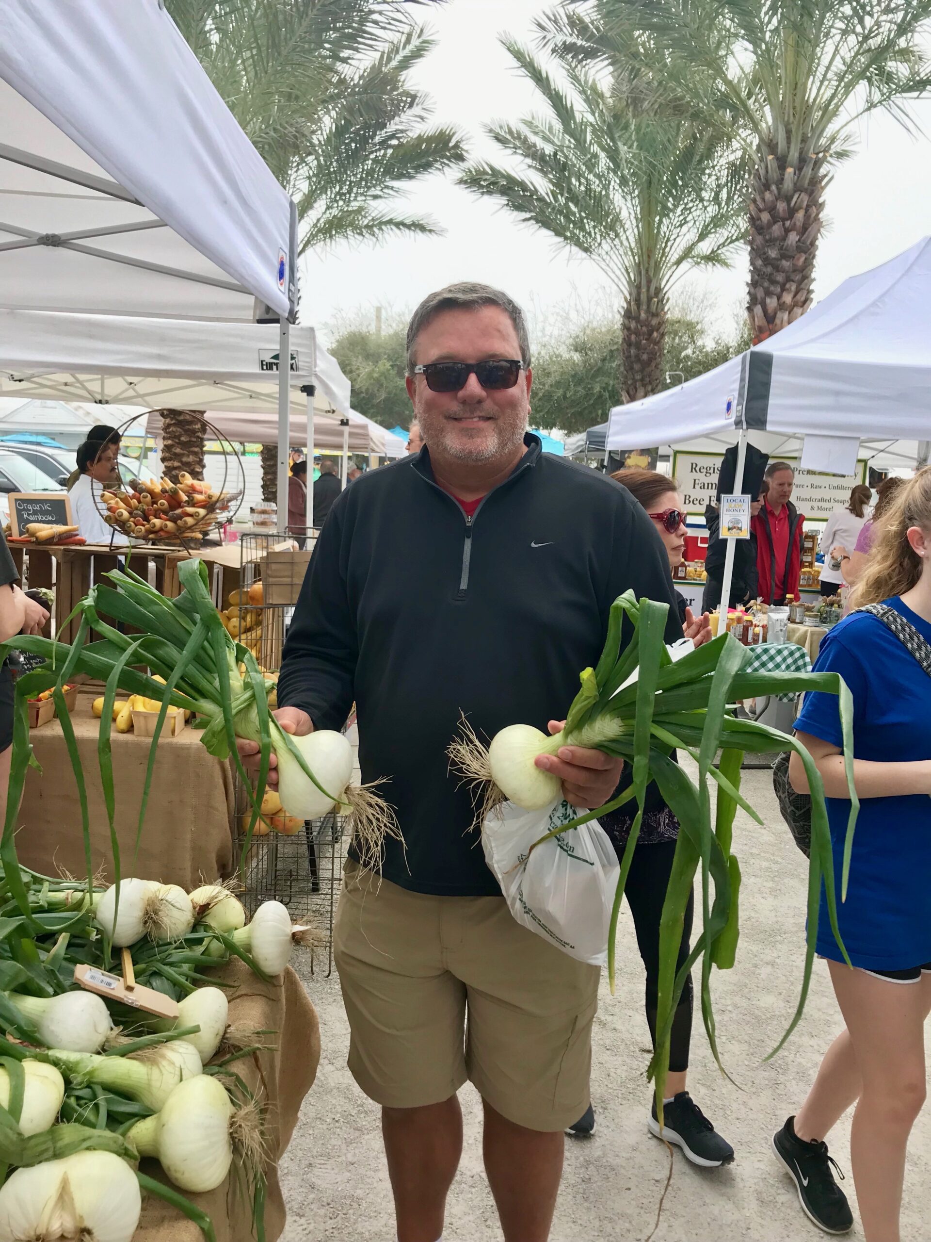 Floyd Jerkins with Onions at Farmers Market